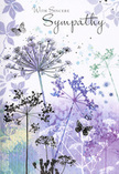 This sympathy card unfolds like a gentle poem painted in watercolour, the sort of scene you might imagine while standing on a quiet path near Amersham Old Town as evening light settles softly over the valley. Airy silhouettes of wildflowers, with their umbelliferous heads spread like tiny canopies, reach upward in graceful curves. They are rendered in layered hues of lavender, indigo, soft blue, and muted green, with each flower head formed from countless delicate dots and strokes, suggesting rather than strictly defining each floret. The stems are fine and slightly curved, as though swaying in a light wind that never quite disturbs the peace of the composition. Behind them, a blurred background of cool purples and silvery greens flows together, like distant trees and hedgerows seen through a veil of mist after rain. Throughout this soft landscape, pale butterflies hover near the blooms, their wings barely tinted and almost translucent, implying transformation and the gentle presence of those who have passed on. The whole palette is cool yet comforting, bringing to mind the quiet calm of the Chiltern hills and the soft hush that follows a summer shower. There is a sense of space and lightness between every stem and petal, allowing the image-and the viewer-to breathe. As someone who creates sympathy arrangements for families across Amersham, I can feel how this design offers solace without intrusion, an understated way to say, I am thinking of you, when words feel fragile. It pairs beautifully with simple, elegant condolence flowers, carrying with it the calm, enduring reassurance of nature's cycles and the hope of gentle healing over time.